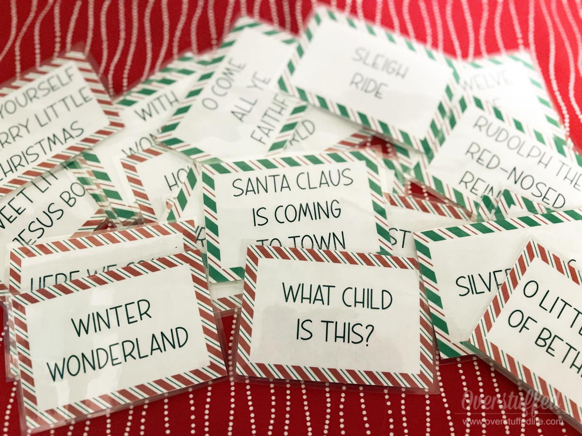 christmas song charades: free party game printable - overstuffed life